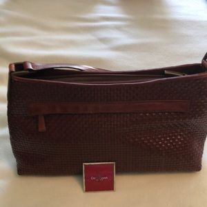 Cole Haan leather purse. Basket weave pattern.